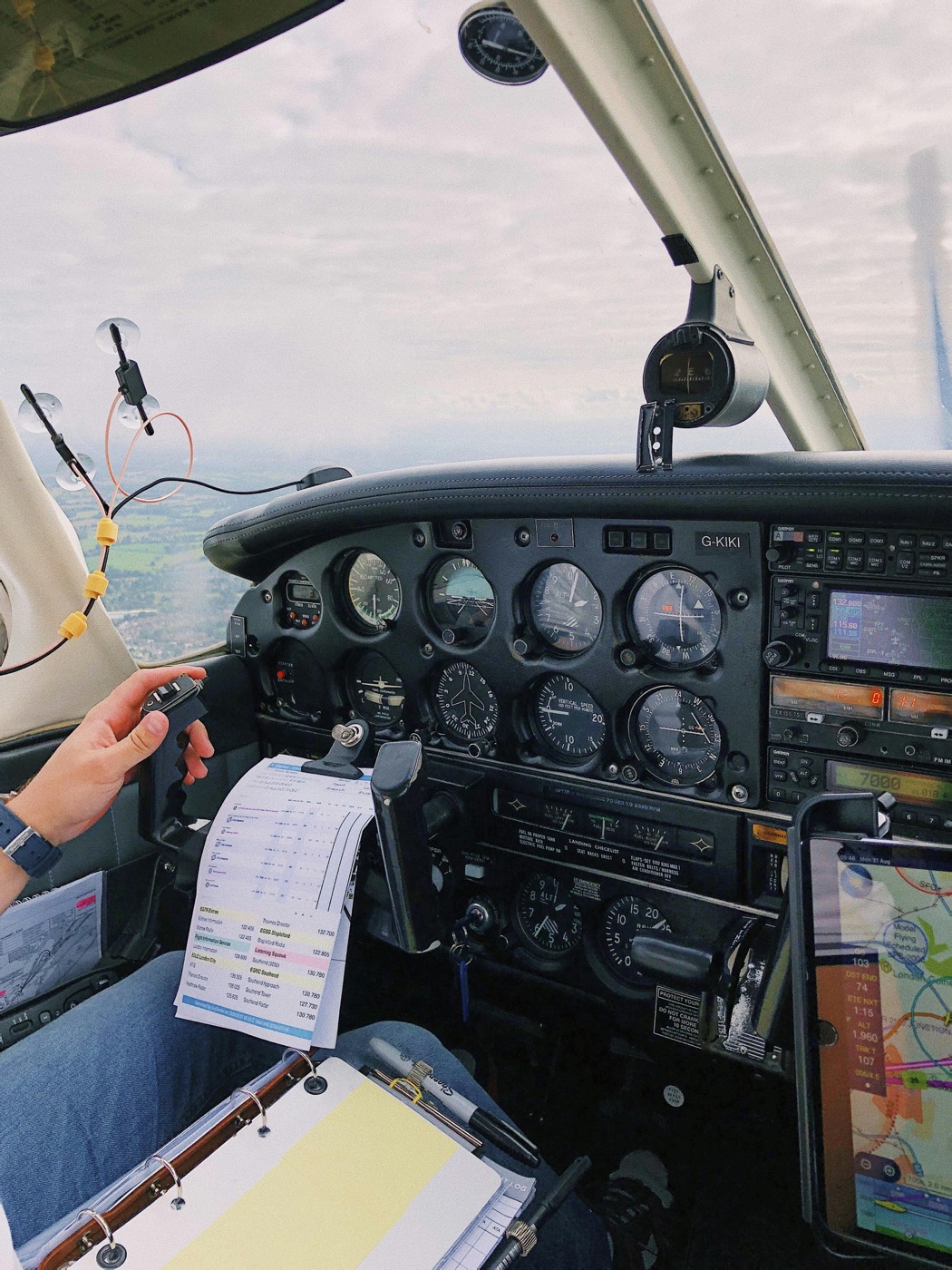 View from the cockpit of a Piper trainer in flight